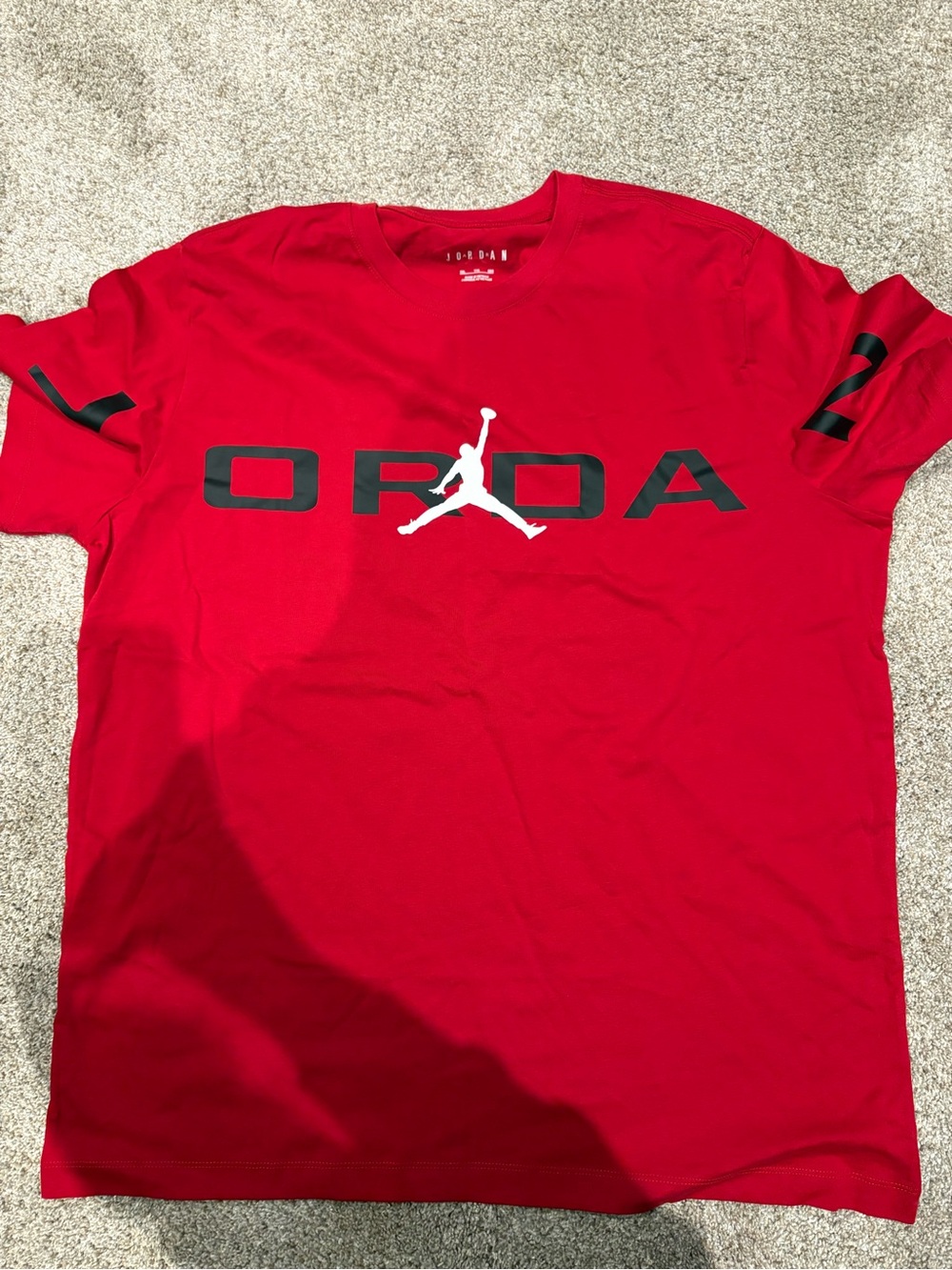 Jordan Red Short Sleeve Tee with Black Lettering and White Jumpman (brand new)